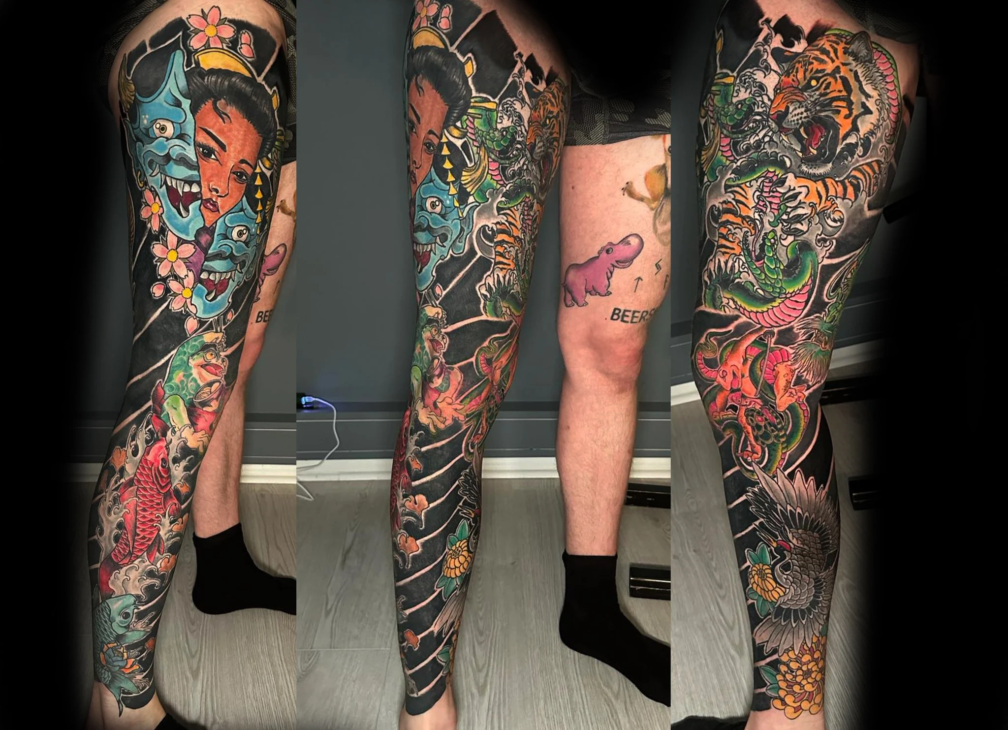 Heldekkende leggtatovering inspirert av japansk kunst, med flere motiver som en tiger, drage, koi-karpe og blomster, alle i sterke farger som skaper en dramatisk og sammenhengende helhet.